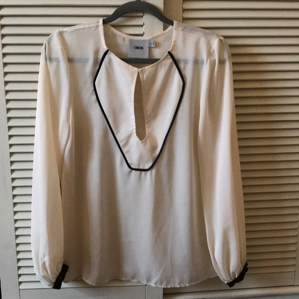 Cream blouse with contrast black piping